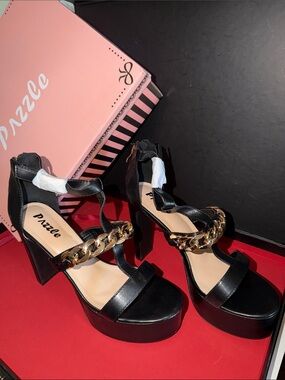 Puzzle Black Platform Sandals with Gold Chain Accent